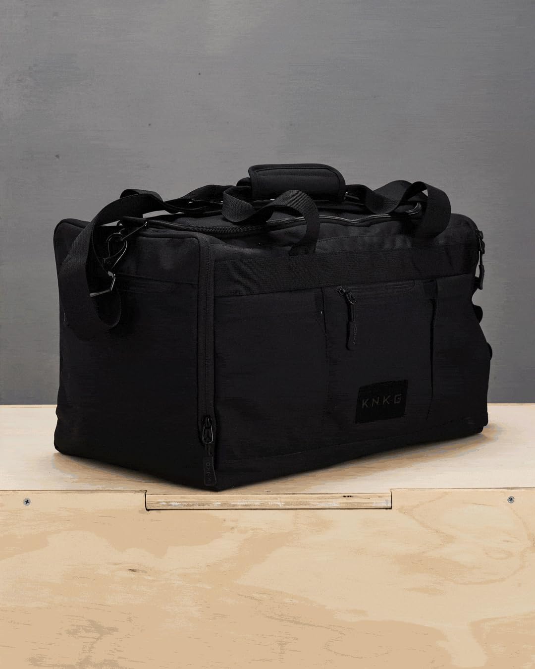 KNKG CORE Duffel Medium 35L - Gym Bag with Lifting Belt Attachment - Durable 500D Nylon, YKK Zippers - Black