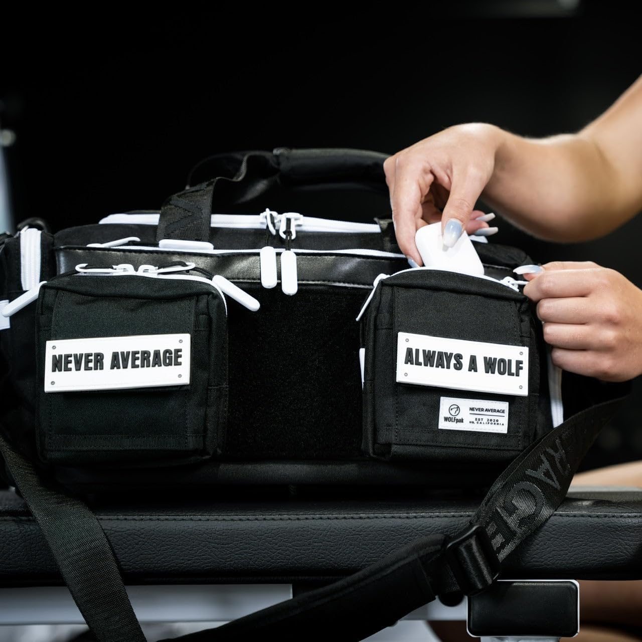 WOLFpak 20L Mini Duffle Bag for Gym & Travel | Waterproof Carry-On Weekender Bag with Shoe Compartment, Hard Bottom, and Tactical Molle System (Black with White Accents)