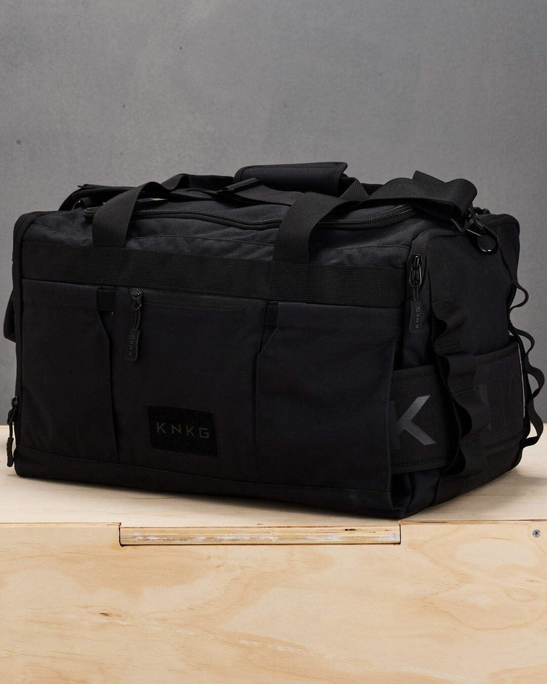 KNKG CORE Duffel Medium 35L - Gym Bag with Lifting Belt Attachment - Durable 500D Nylon, YKK Zippers - Black